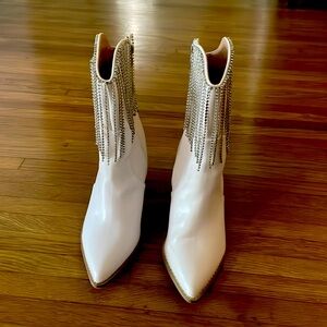 White rhinestone fringe boots. Small black scuff on top of boots.